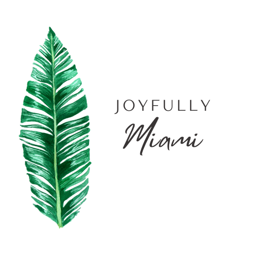 Joyfully Miami Logo with green palm leaf on the lefthand side.